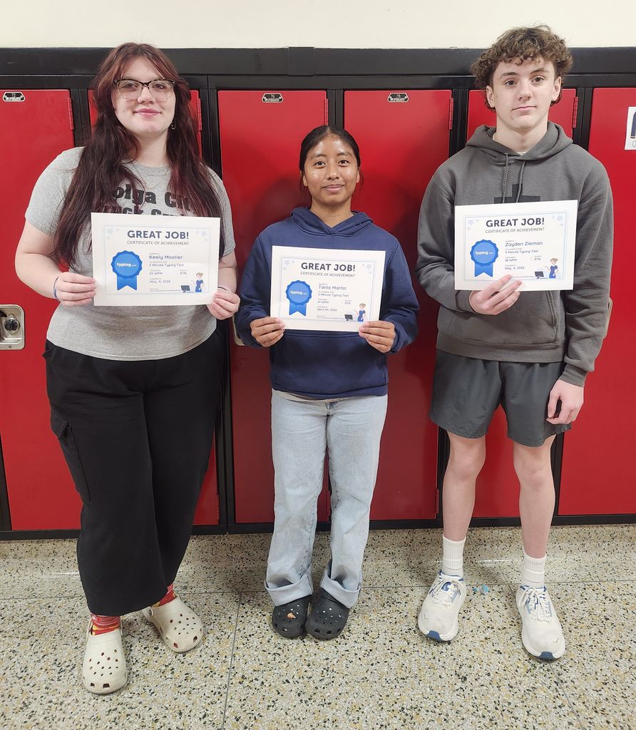 students holding certificates of awards